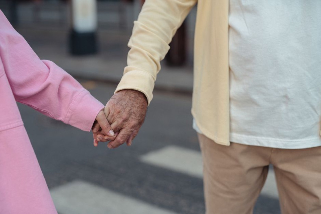 Elderly couple holding hands - Best Funeral Cover in South Africa