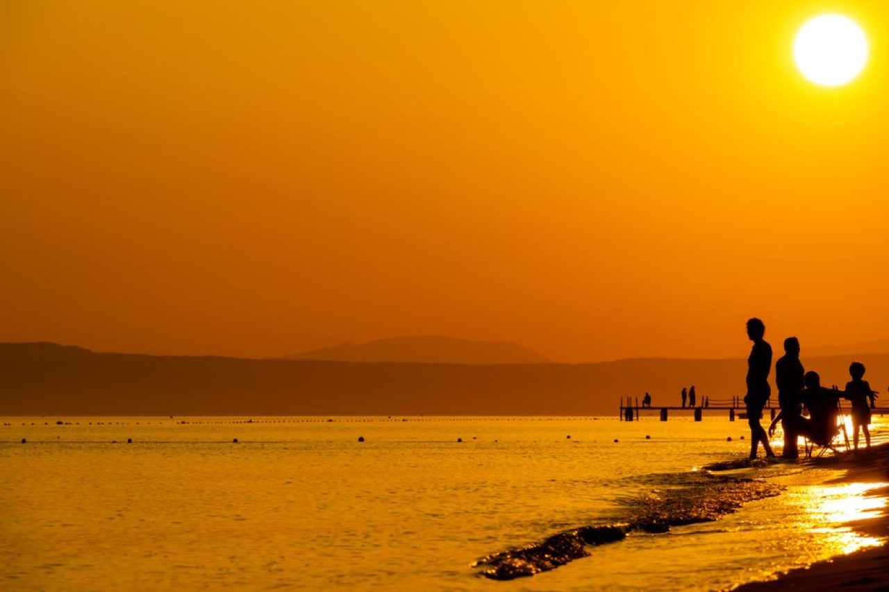 Family silhouette sunset - Funeral Cover for Pensioners