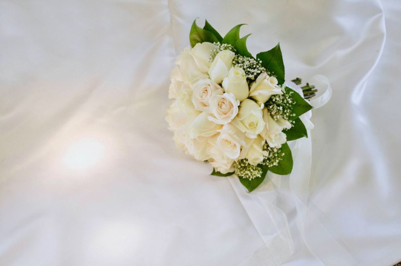 AVBOB: funeral cover, contact numbers and how to claim White roses bouquet - AVBOB: funeral cover, contact numbers and how to claim