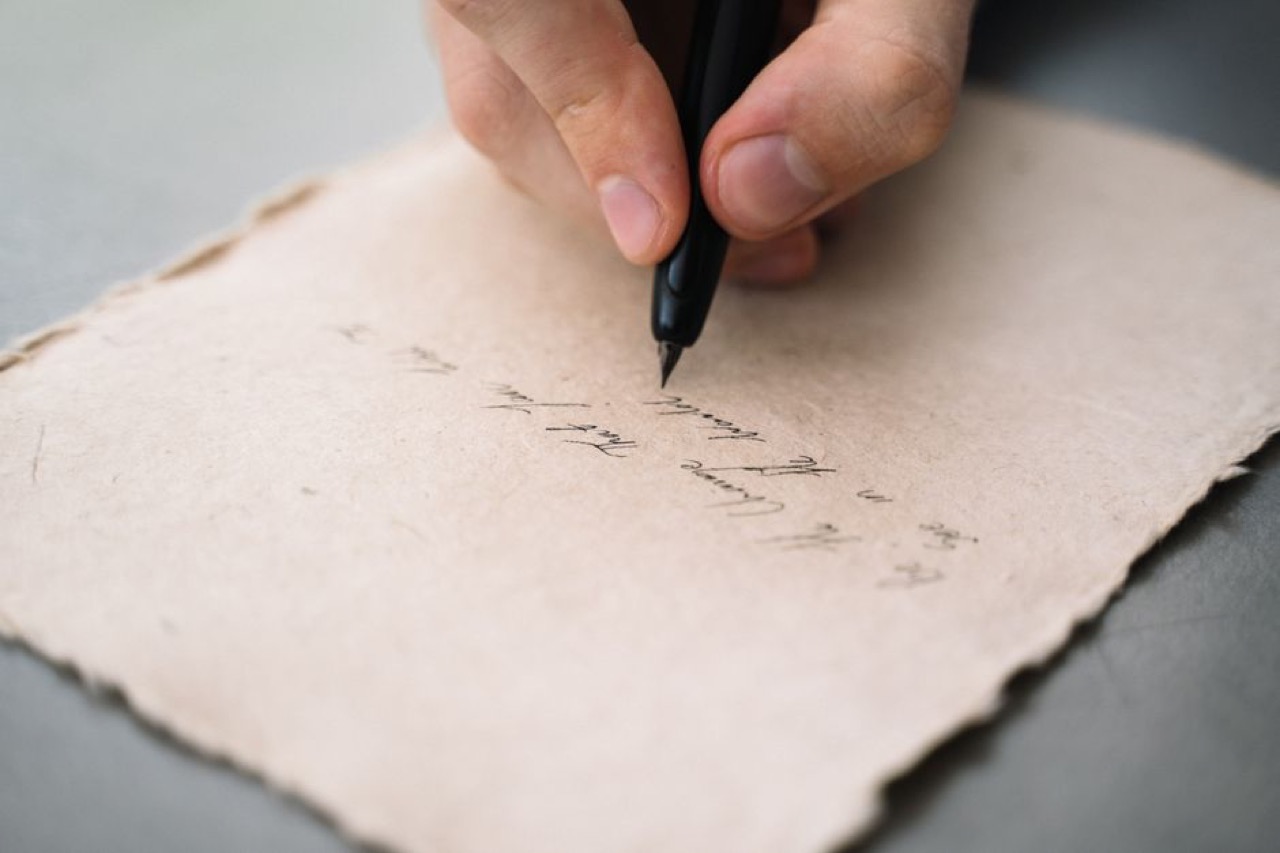 Funeral flower arrangements explained Handwriting letter close up - Funeral flower arrangements explained