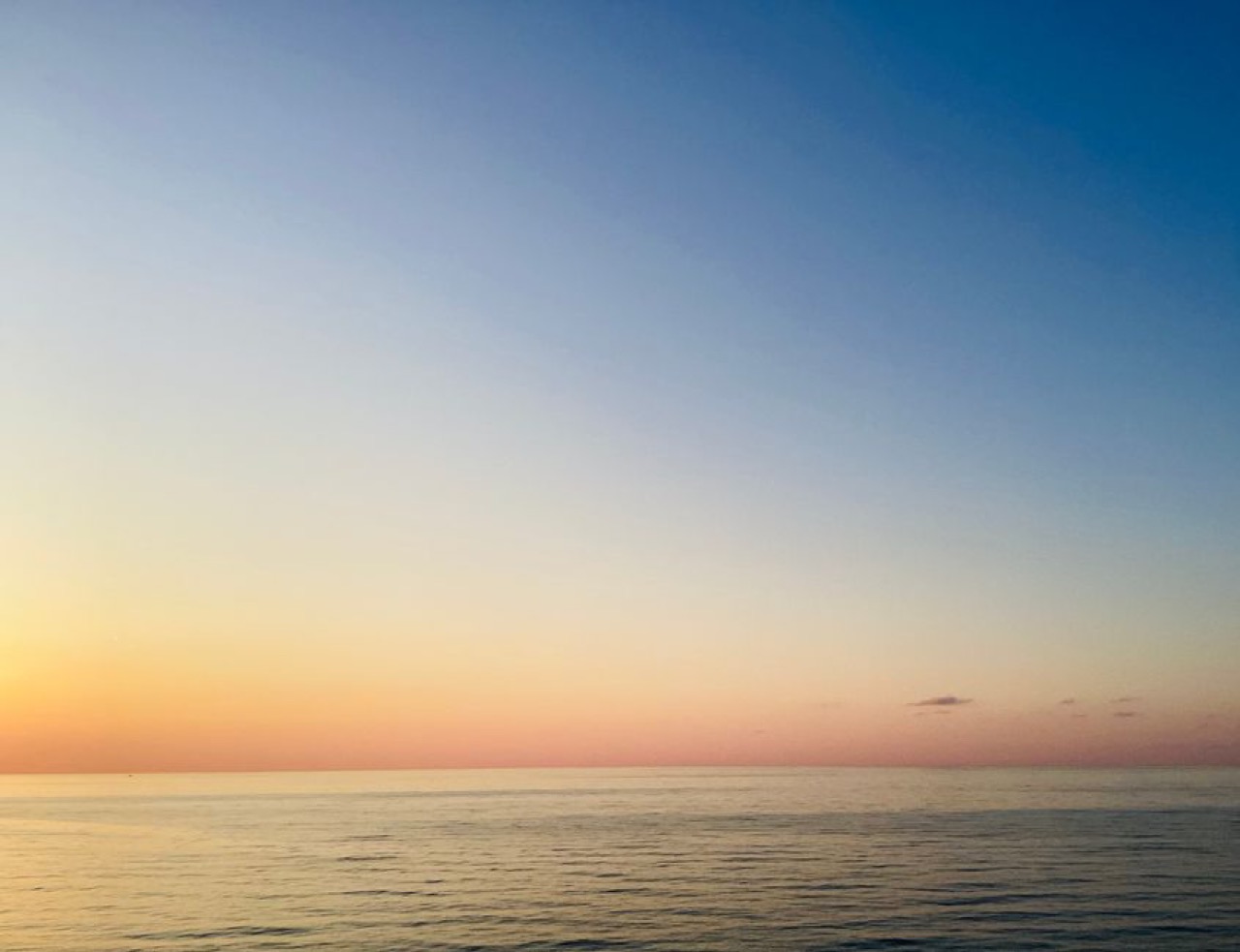 Calm sunset ocean - Funeral tombstones and unveilings in South Africa
