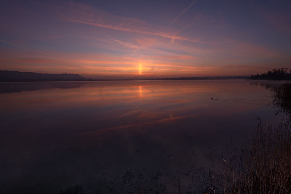 Still lake reflection sunrise - How to register a death in South Africa